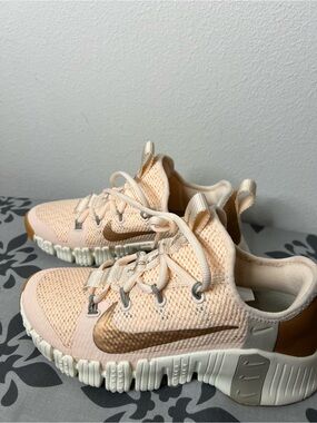 Nike Peach and Gold Athletic Sneakers